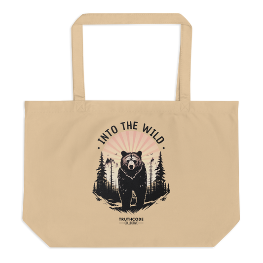 Beige organic tote bag with bear graphic and 'Into the Wild' text on a white background