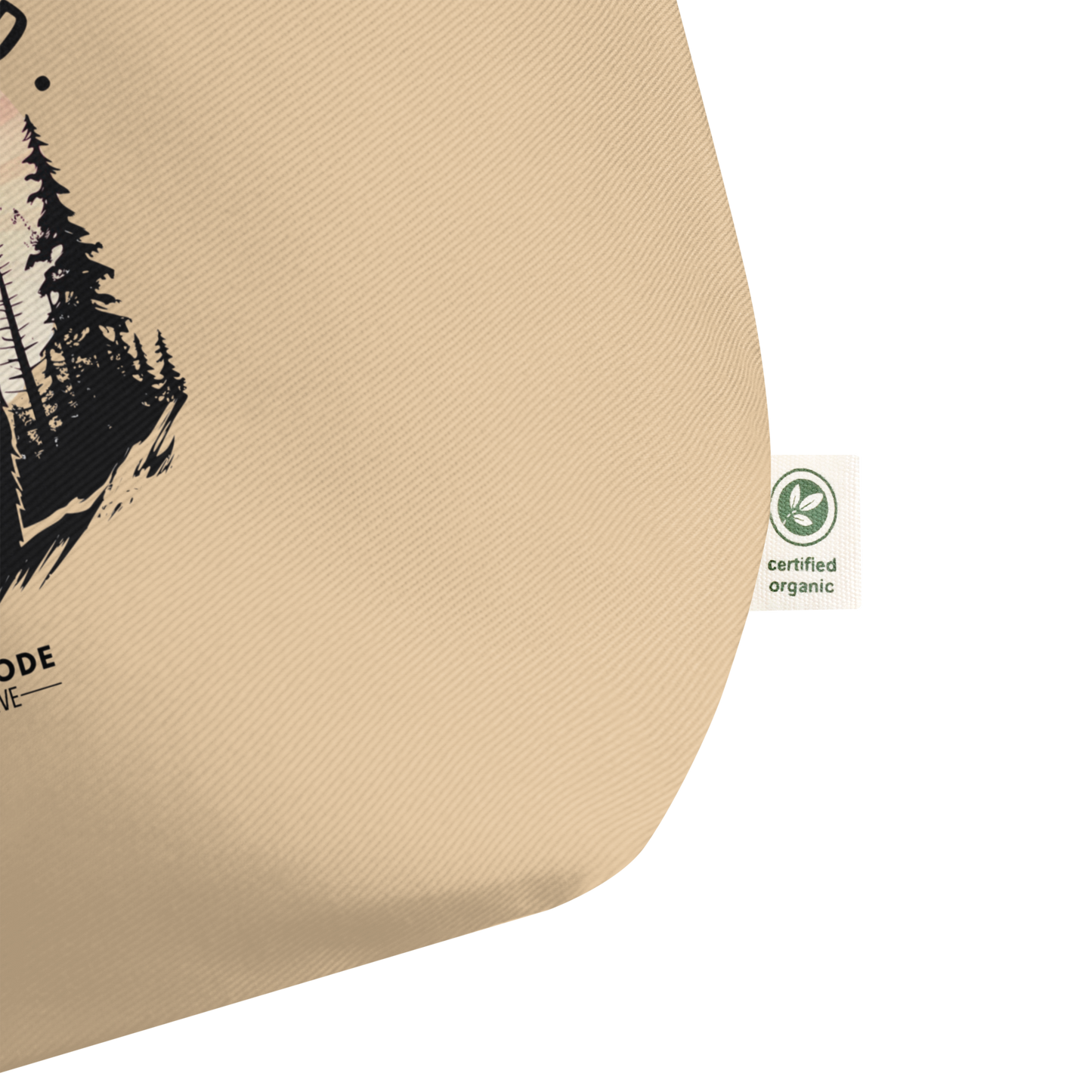Corner of beige tote bag showing certified organic label on a white background