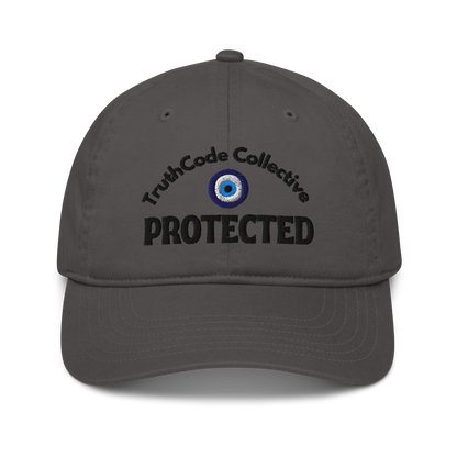 Gray cap with 'TruthCode Collective PROTECTED' text and eye symbol all embroidered