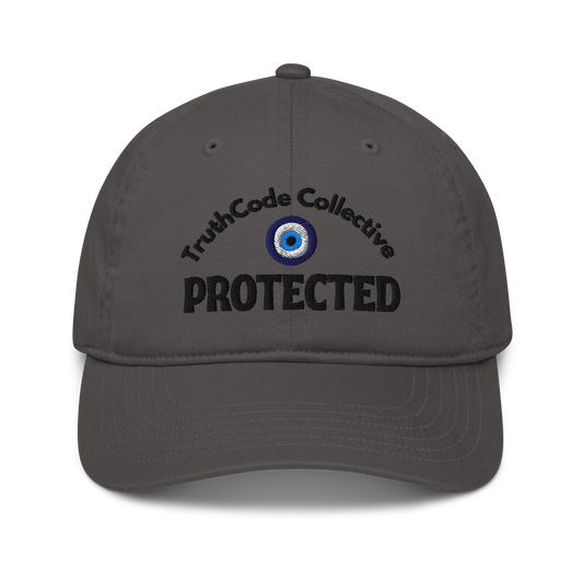 Gray cap with 'TruthCode Collective PROTECTED' text and eye symbol all embroidered