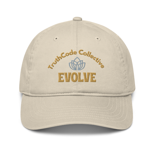 Beige cap with embroidered lotus logo and text 'Truthcode collective evolve'
