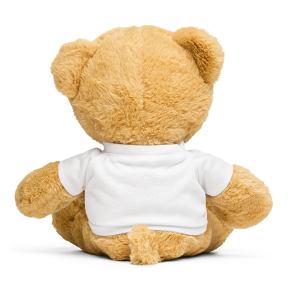 Tan teddy bear wearing a white shirt showing the back of the bear,  on a white background