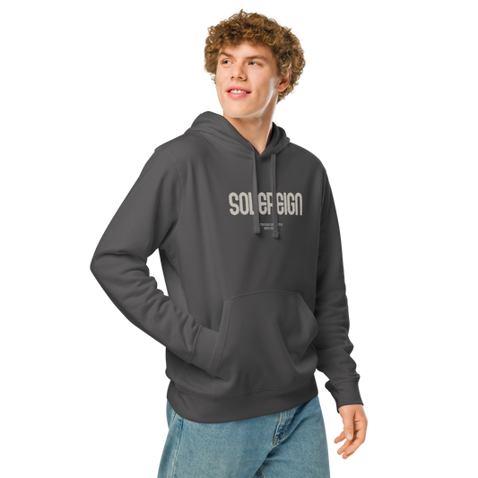Guy wearing gray organic hoodie with 'Sovereign' text on a white background
