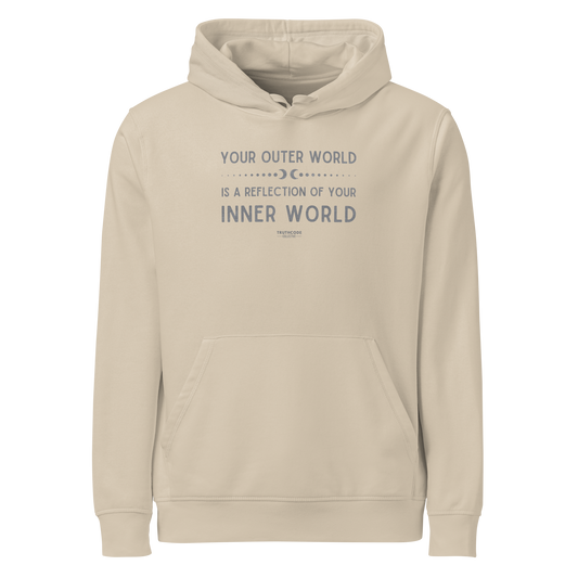 Beige organic hoodie with text 'Your outer world is a reflection of your inner world' on a white background
