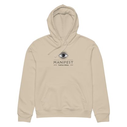 Beige organic hoodie with text 'Manifest' eye graphic design on a white background