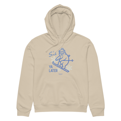 Beige organic hoodie with a skiing bear graphic and text 'Ski you later' on a white background