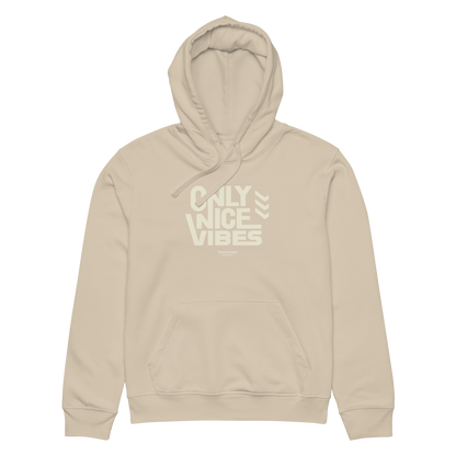 Beige organic hoodie with 'Only Nice Vibes' text design on a white background