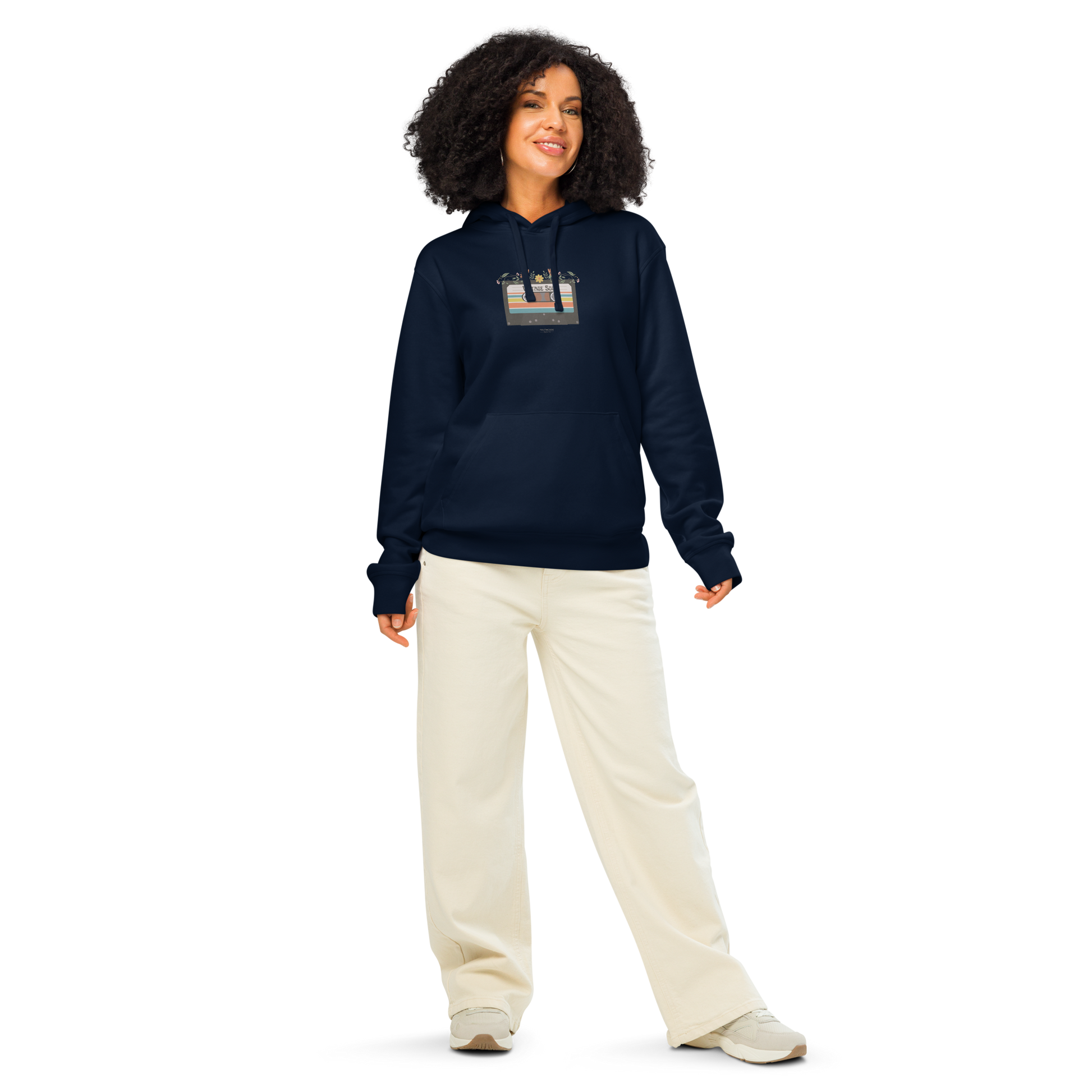 Woman wearing navy blue organic hoodie with a graphic design of cassette tape and 'Vintage soul' text, against a white background