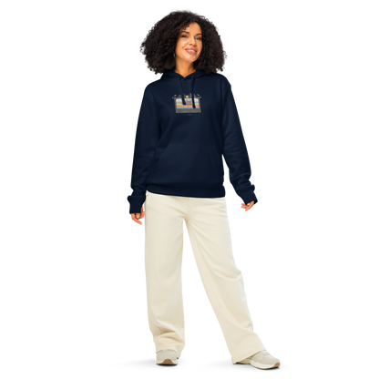 Woman wearing navy blue organic hoodie with a graphic design of cassette tape and 'Vintage soul' text, against a white background