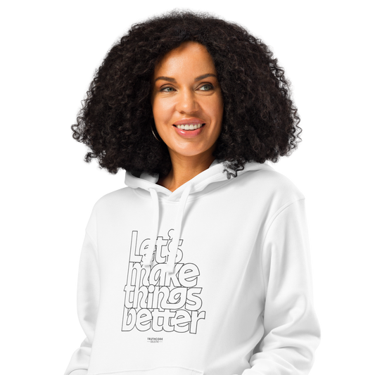 Woman wearing white organic hoodie with 'Let's Make Things Better' text on a white background