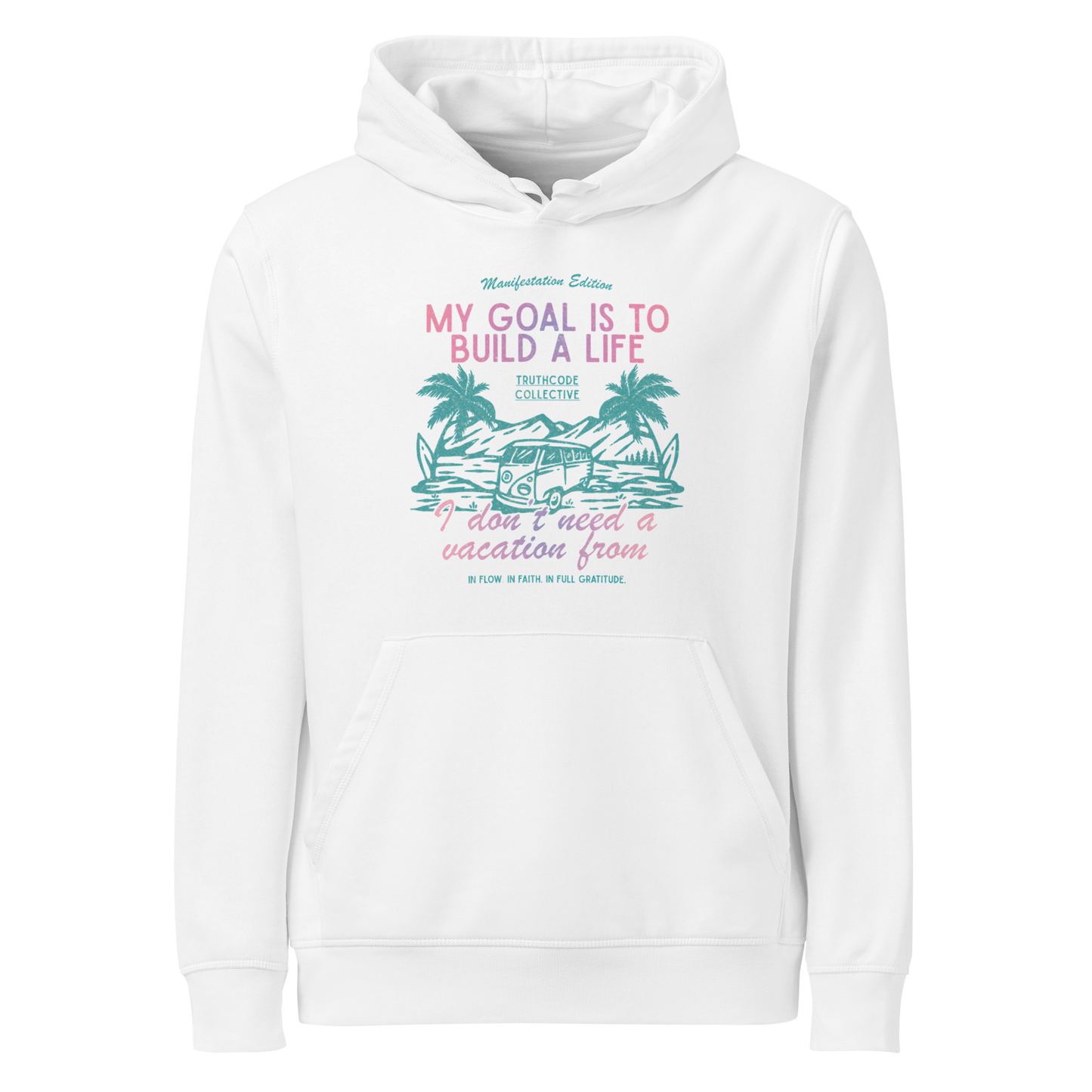 White organic hoodie with tropical graphic and text 'My goal is to build a life I don't need a vacation from' on a white background