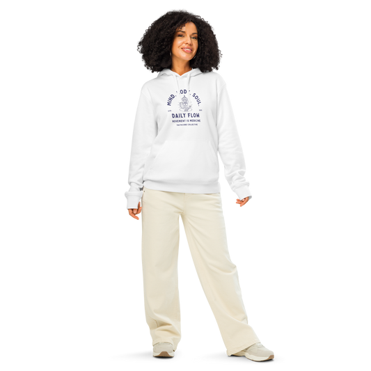 Woman wearing white organic hoodie with 'Mind Body Soul, Daily Flow, Movement is medicine' text and meditation graphic design on a white background