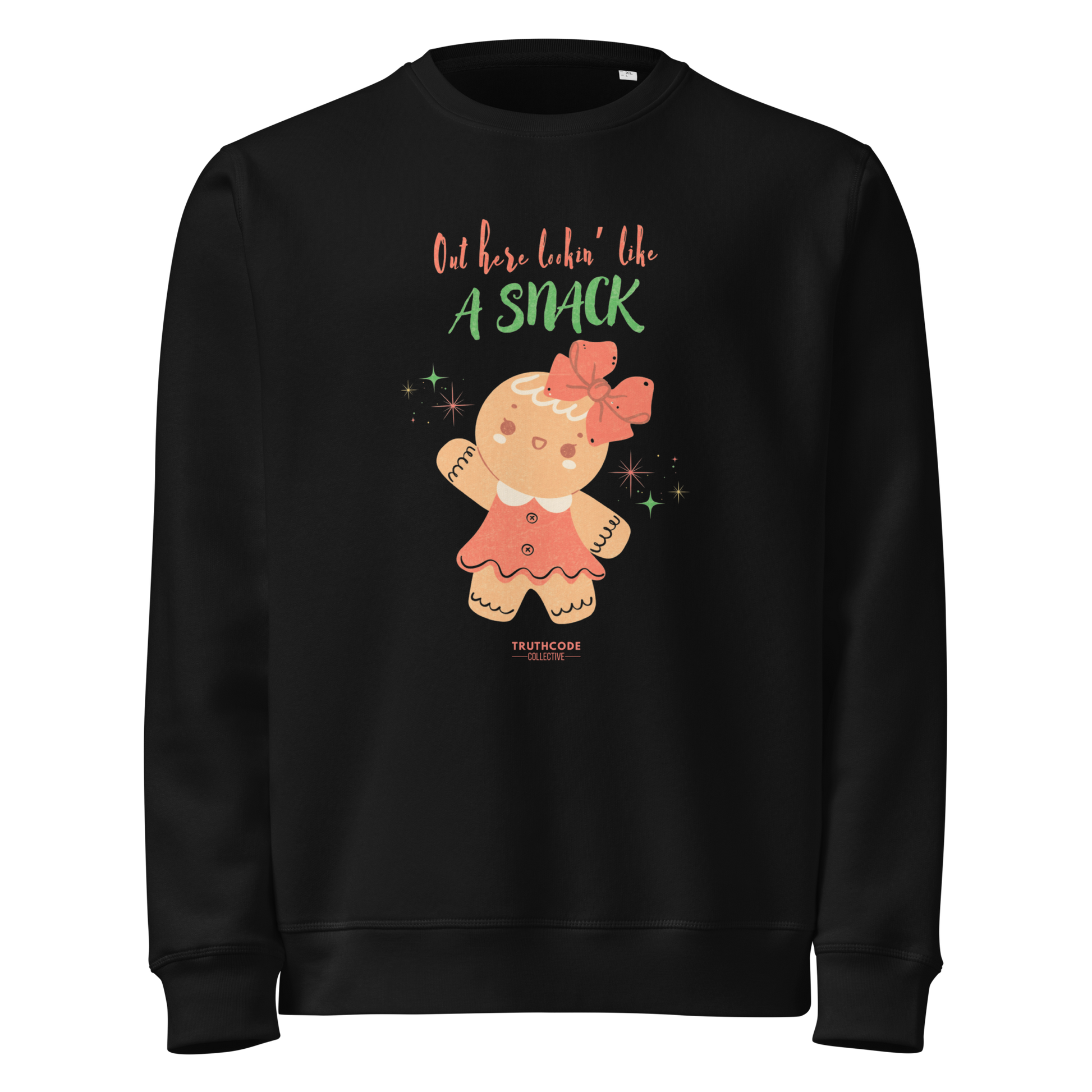 Black organic sweatshirt with a gingerbread girl graphic and text 'Out here lookin' like a snack' on a white background