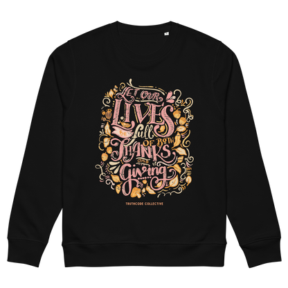 Black organic sweatshirt with colorful text design 'Let our lives be full of both thanks and giving' on a white background
