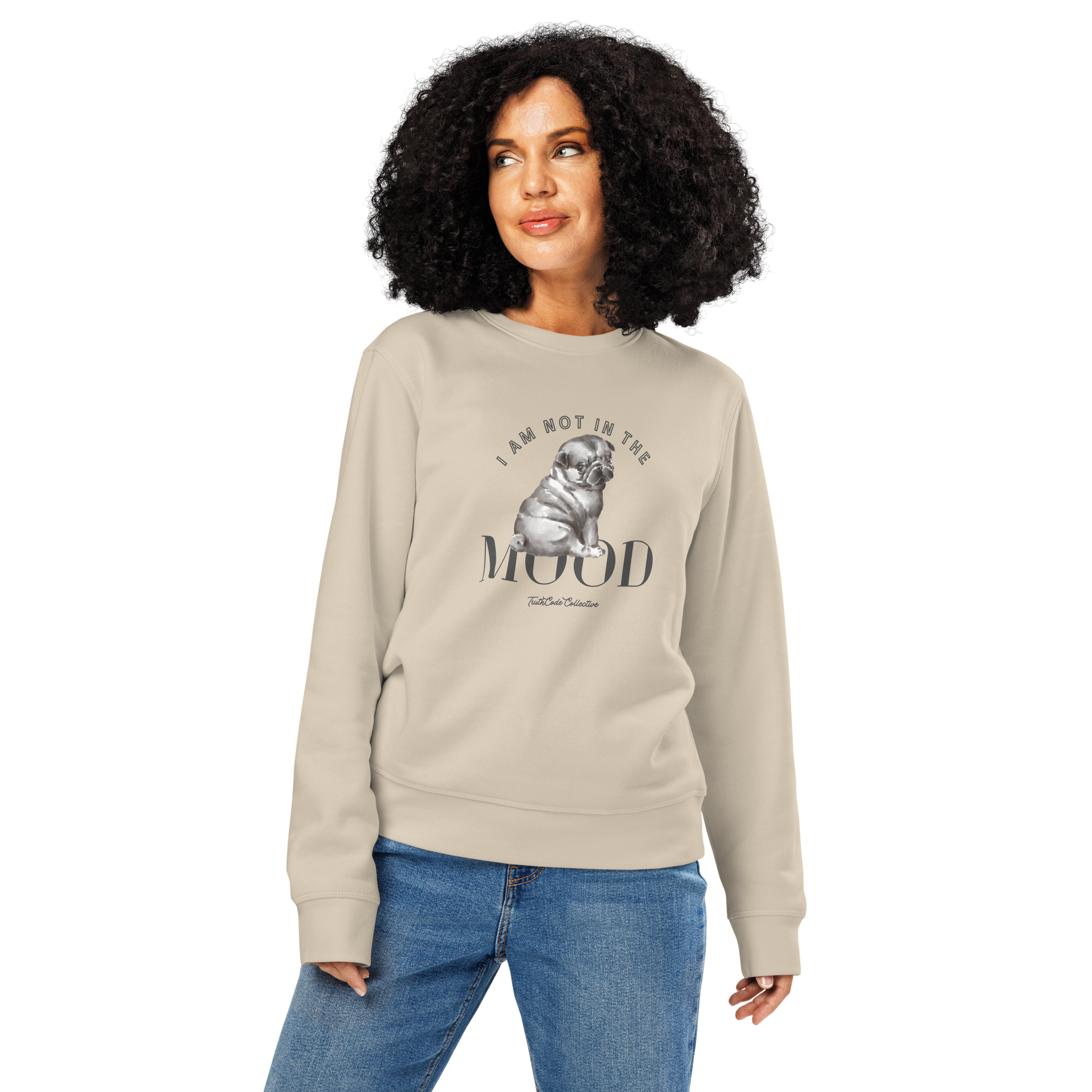 Woman wearing beige organic sweatshirt with a pug graphic and text 'I am not in the mood' on a white background