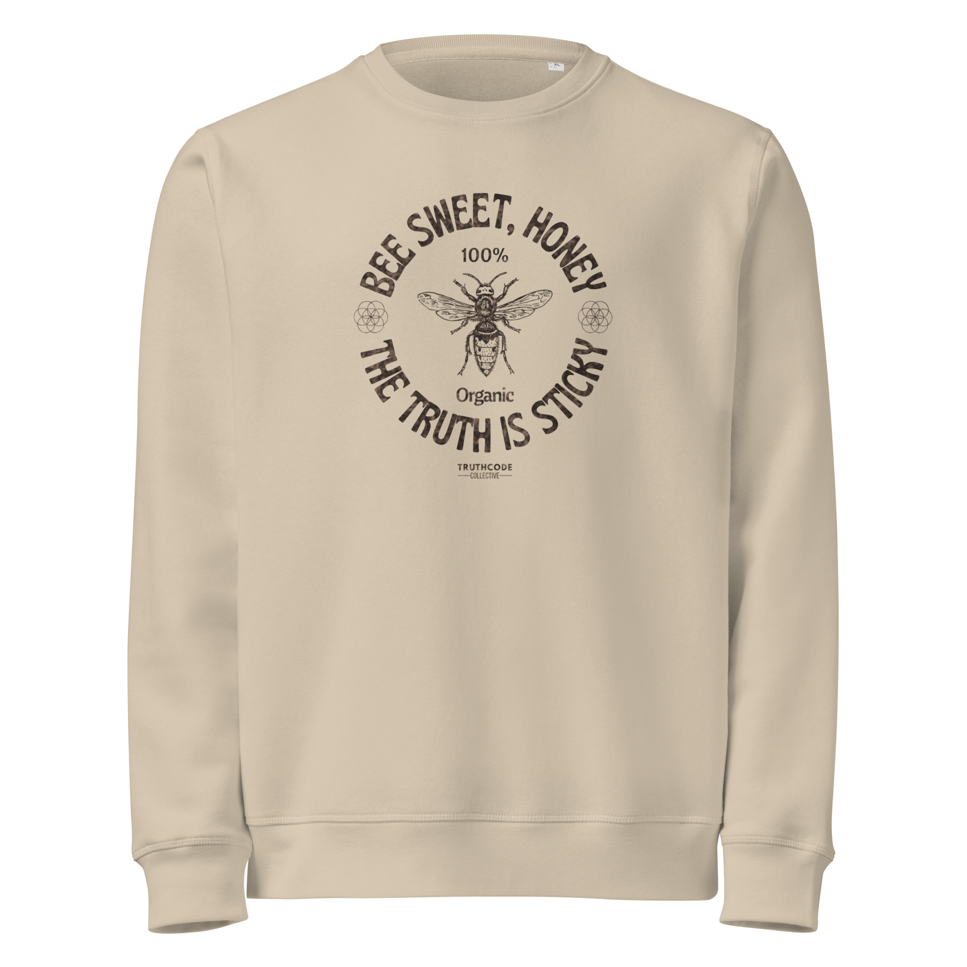 Beige organic sweatshirt with bee graphic and text 'Bee sweet, honey' and 'the truth is sticky' on a white background