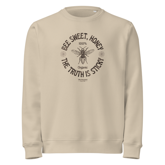 Beige organic sweatshirt with bee graphic and text 'Bee sweet, honey' and 'the truth is sticky' on a white background