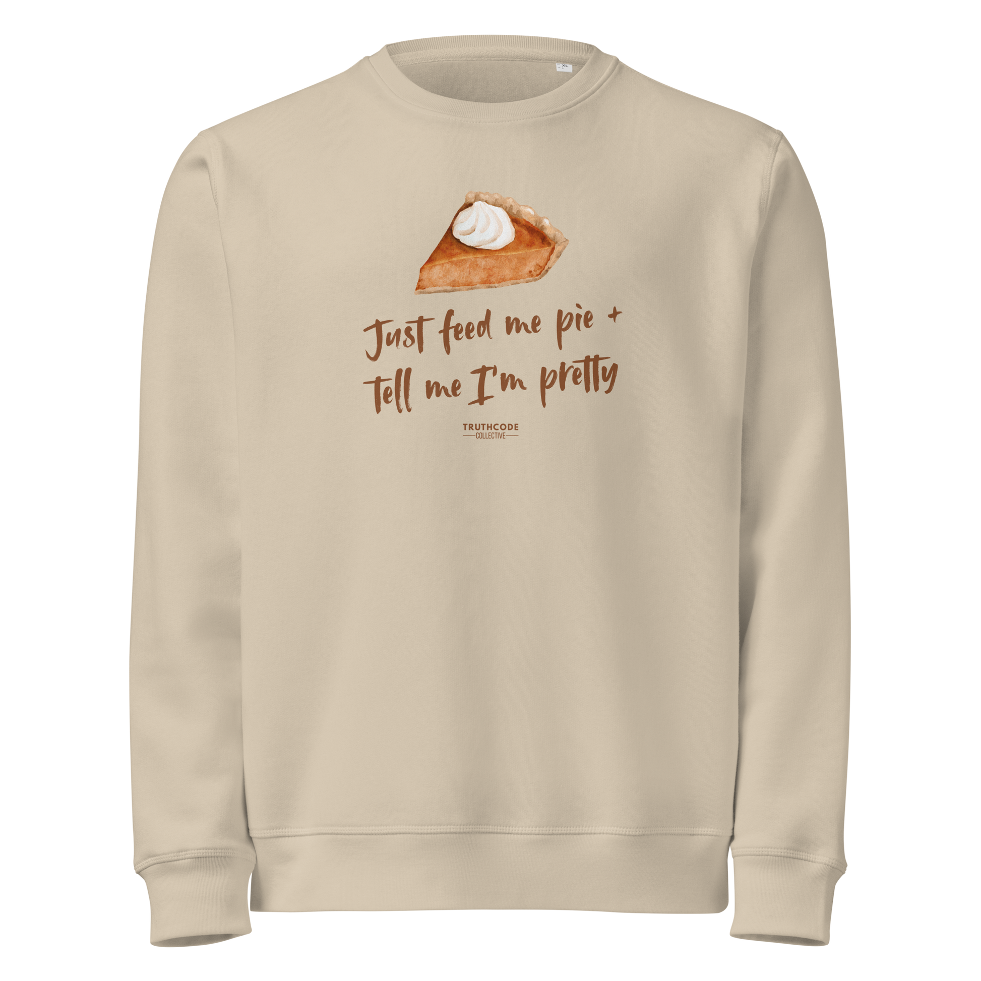 Beige organic sweatshirt with pie graphic and text 'Just feed me pie and tell me I'm pretty' on a white background