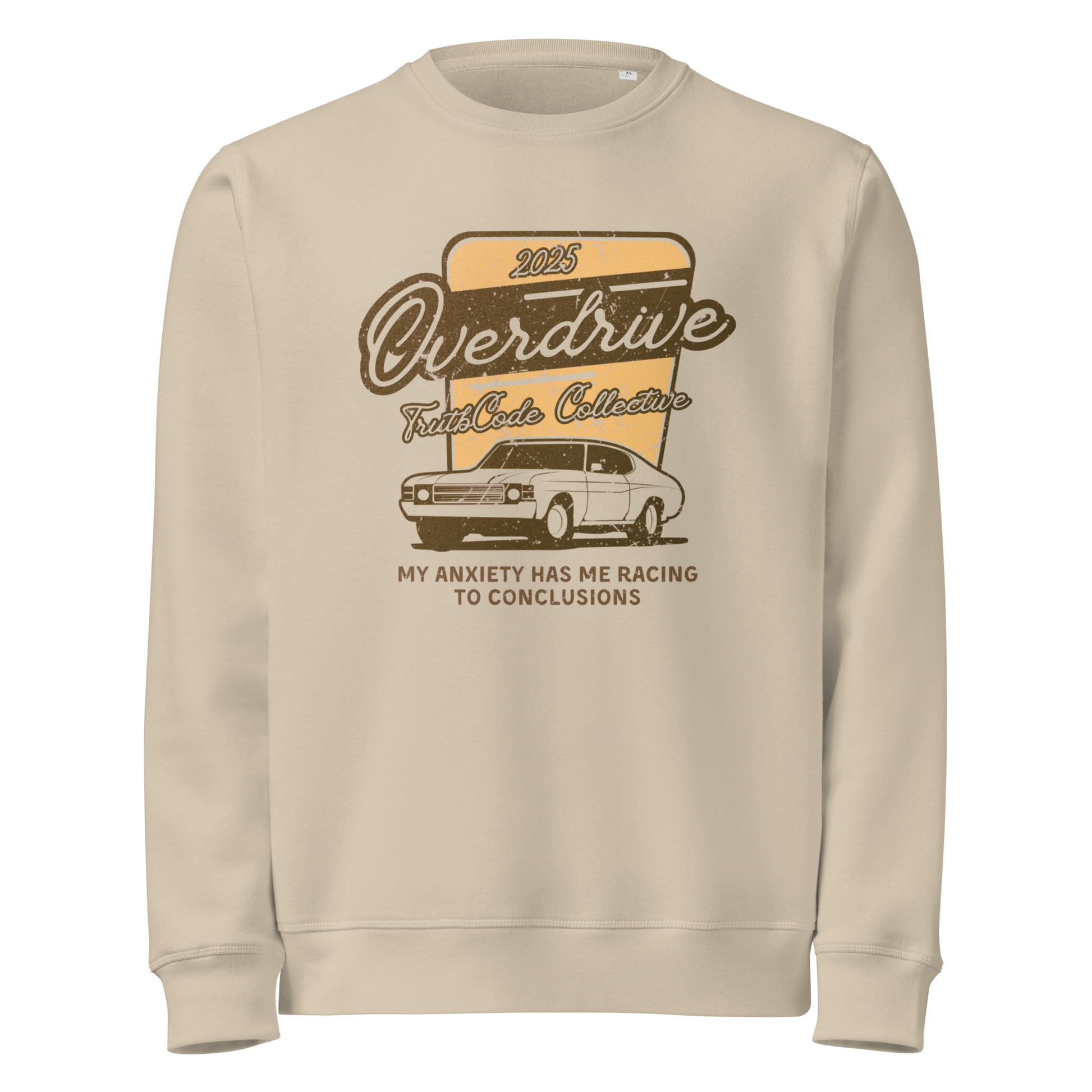 Beige organic sweatshirt with a vintage graphic design of a car and text 'Overdrive, my anxiety has me racing to conclusions' on a white background