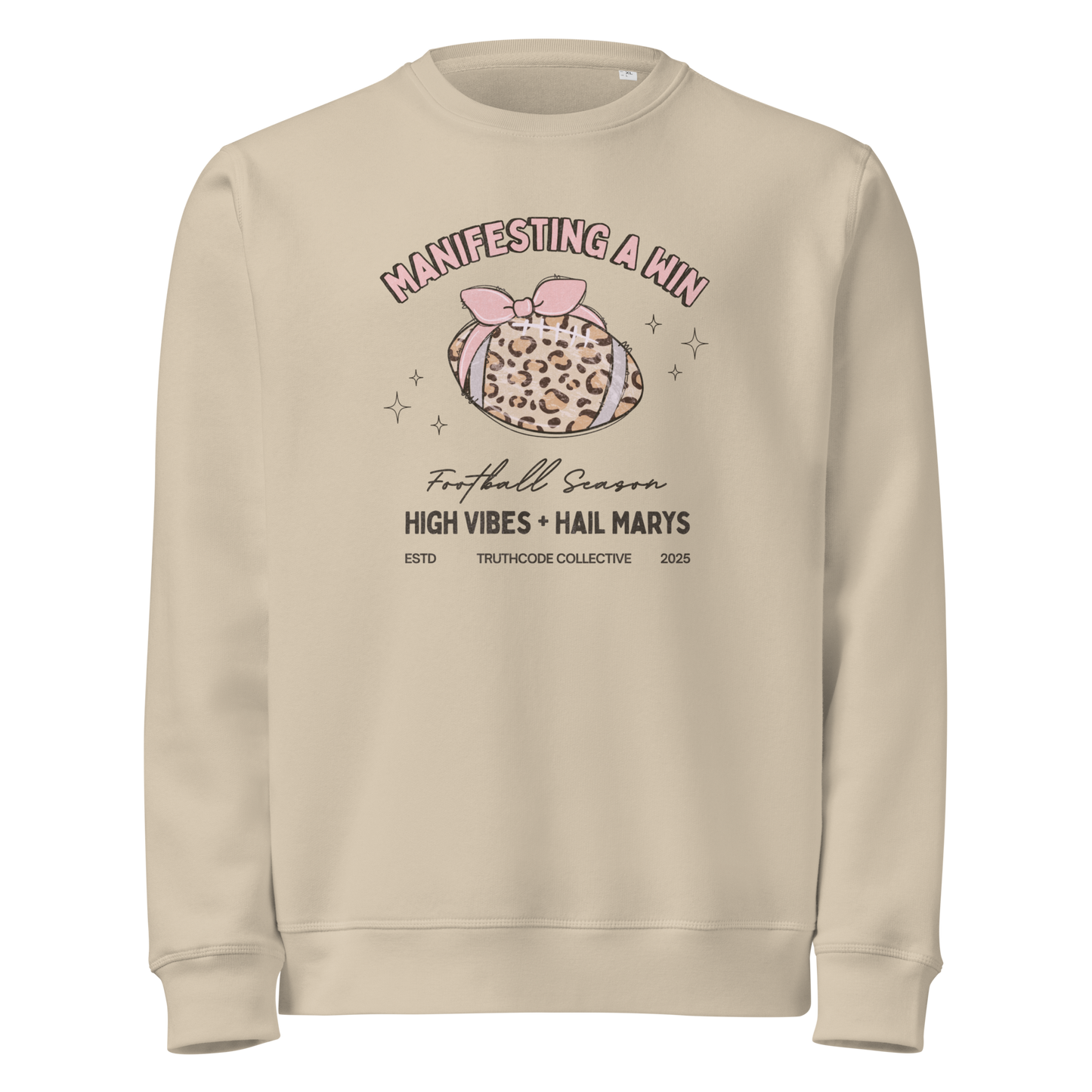Beige organic sweatshirt with girly football graphic design and text 'Manifesting a win, high vibes + hail marys' on a white background
