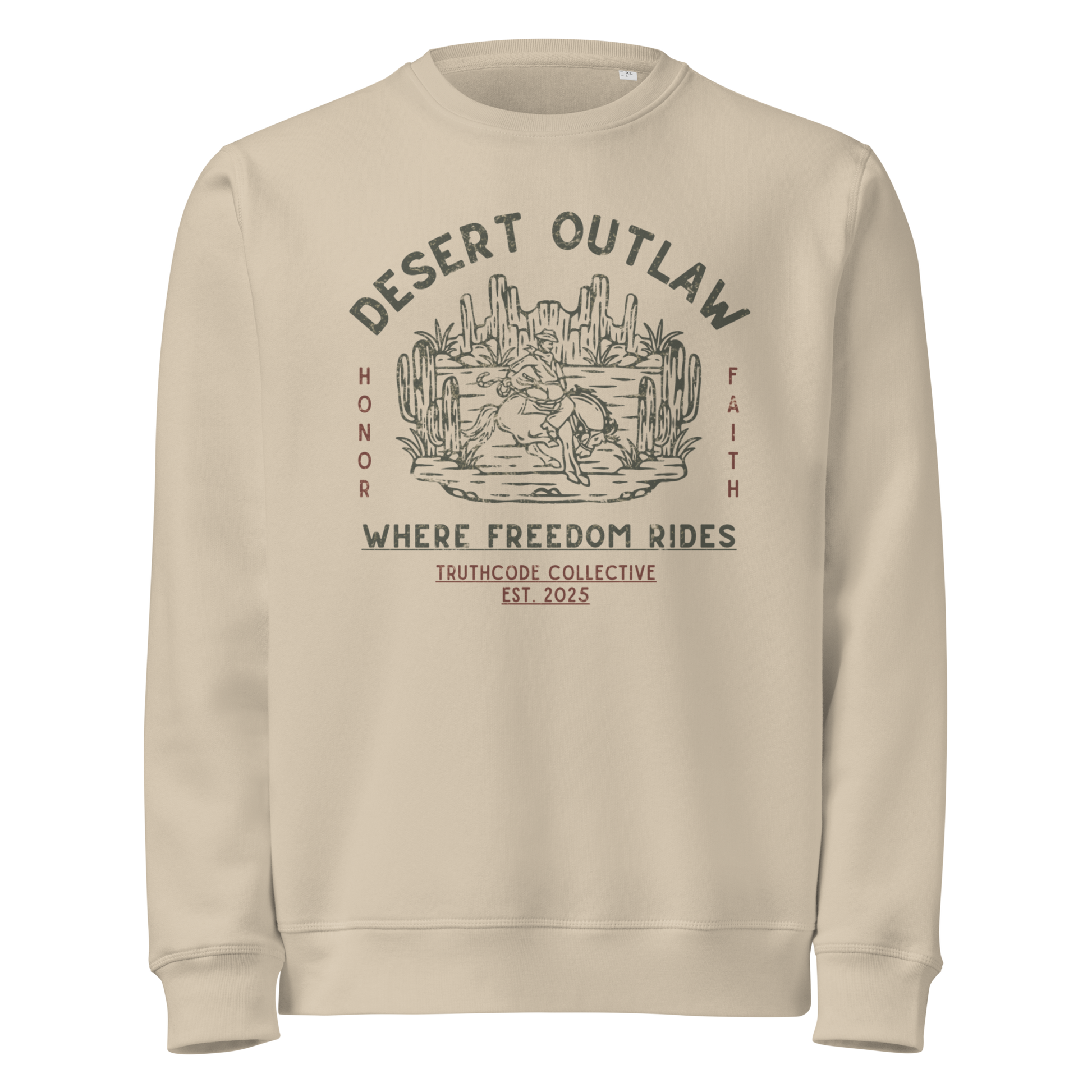 Beige organic sweatshirt with 'Desert Outlaw, where freedom rides' text and graphic design of cowboy riding a broco in the desert, on a white background
