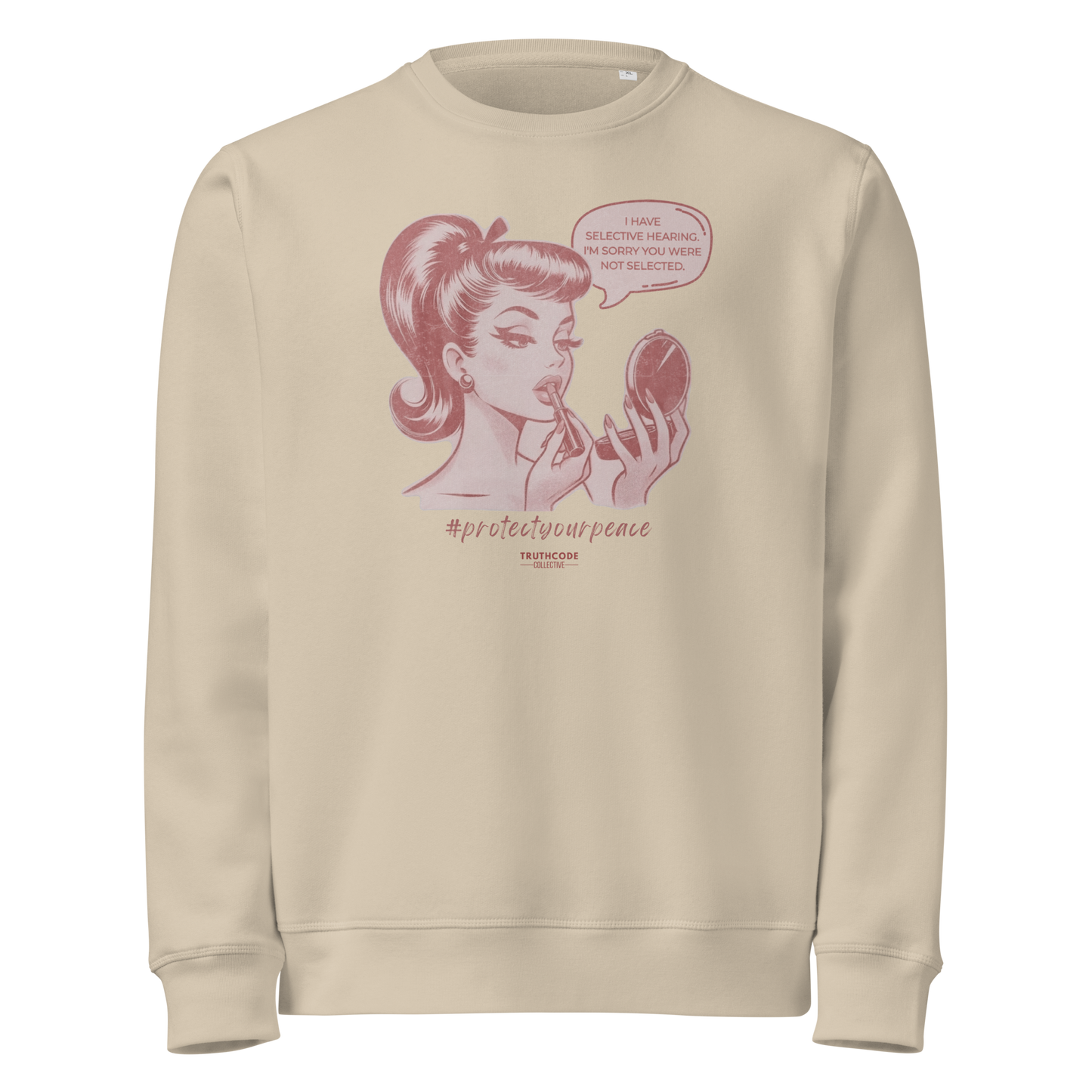 Beige organic sweatshirt with a vintage style graphic of a woman and text 'I have selective hearing. I'm sorry you weren't selected' on a white background