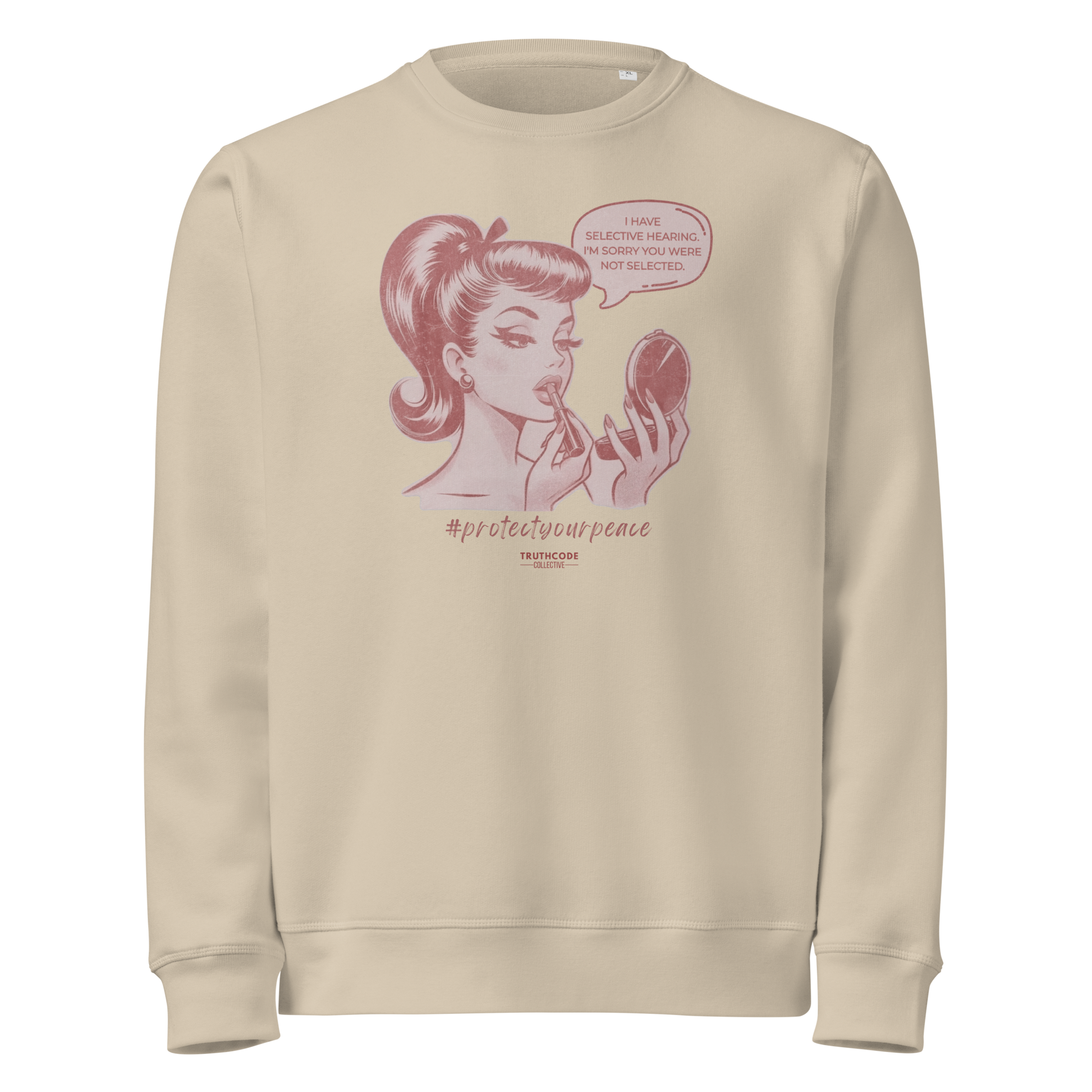 Beige organic sweatshirt with a vintage style graphic of a woman and text 'I have selective hearing. I'm sorry you weren't selected' on a white background