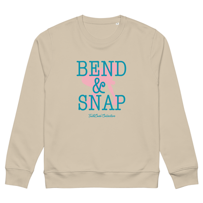 Beige organic sweatshirt with 'Bend & Snap' text and graphic design of football center ready to snap the ball, on a white background