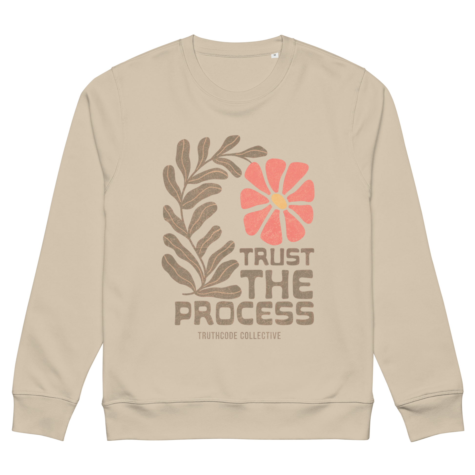 Beige organic sweatshirt with floral design and 'Trust The Process' text on a white background