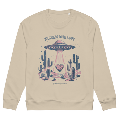 Beige organic sweatshirt with a UFO and cactus design and text 'Beaming with love', on a white background