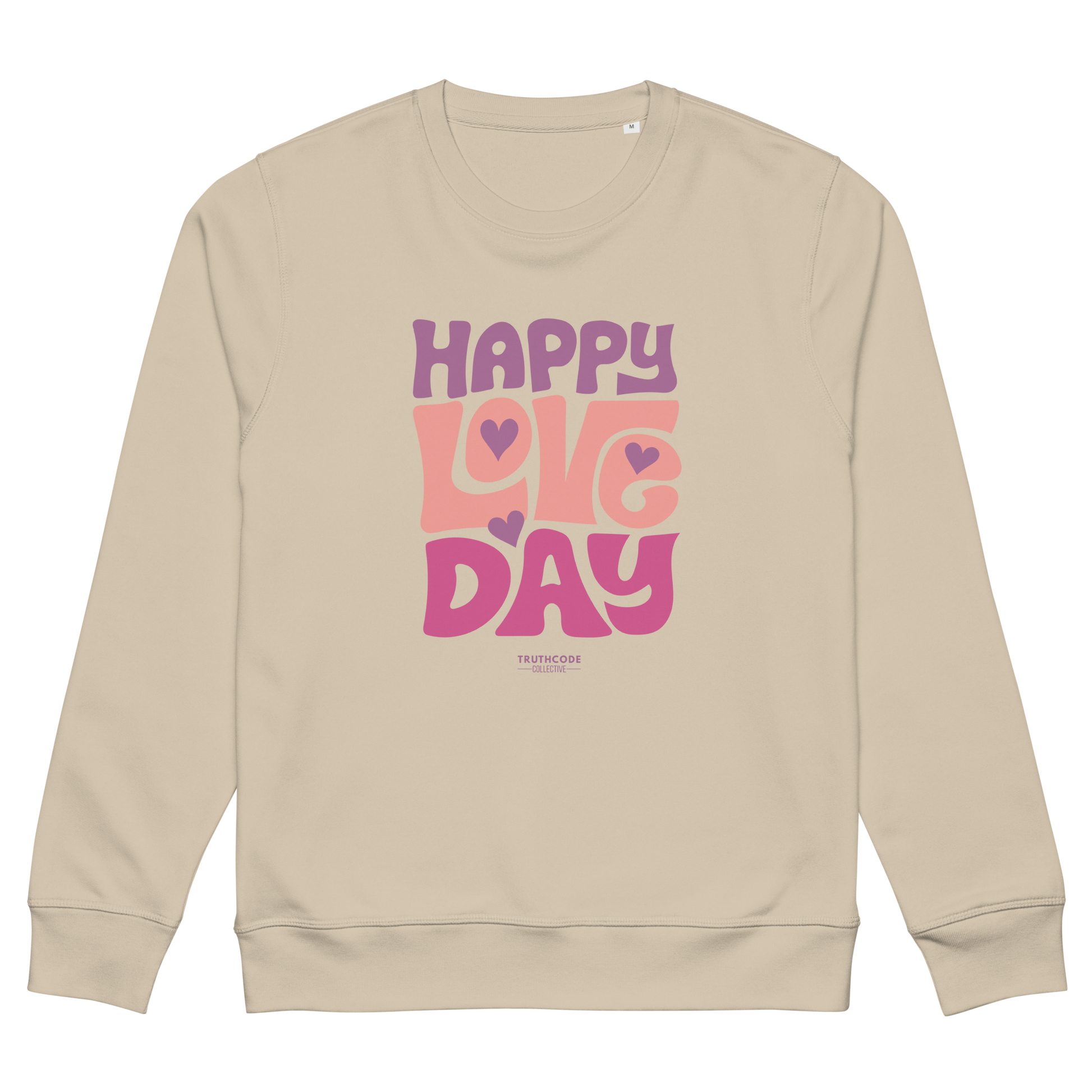 Beige organic sweatshirt with 'Happy Love Day' text in pink and purple on a white background