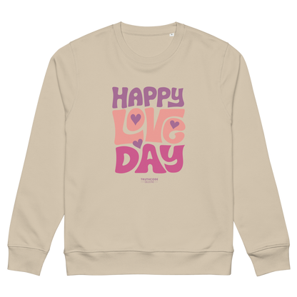 Beige organic sweatshirt with 'Happy Love Day' text in pink and purple on a white background