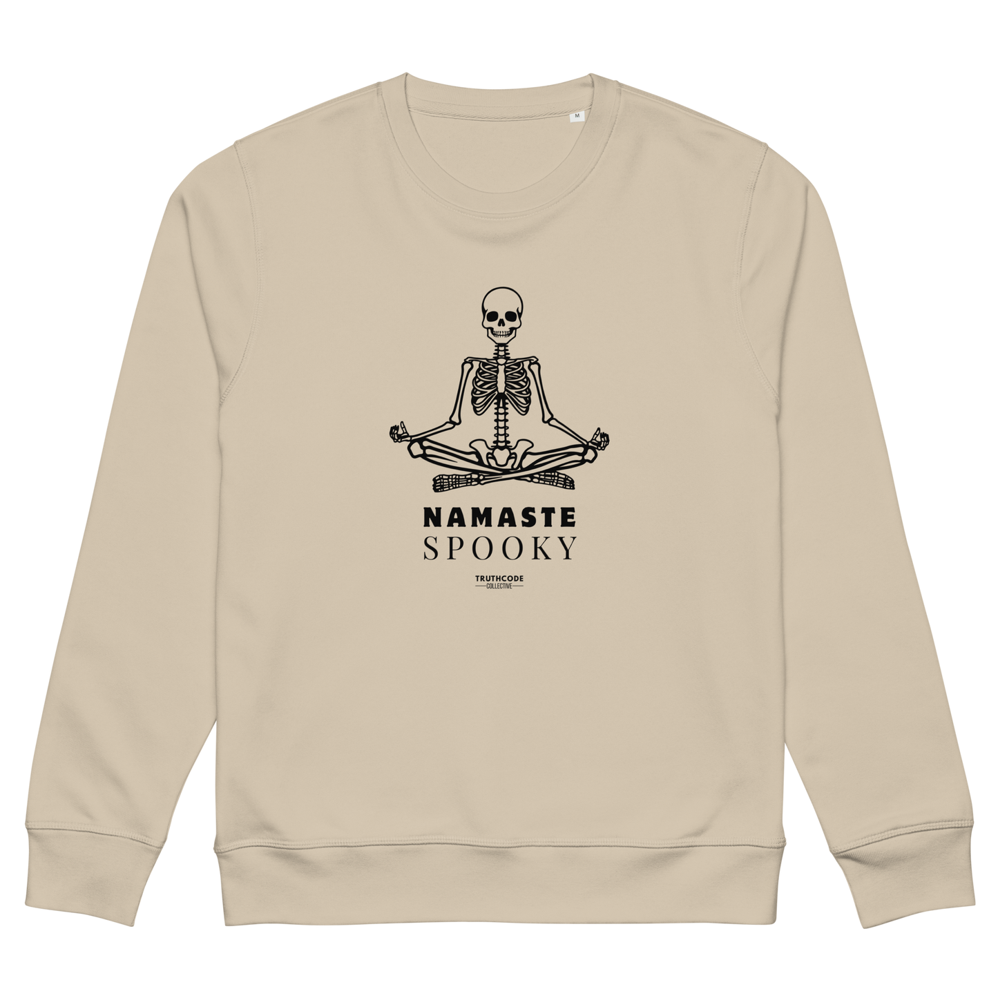 Beige organic sweatshirt with a skeleton design and 'Namaste Spooky' text on a white background