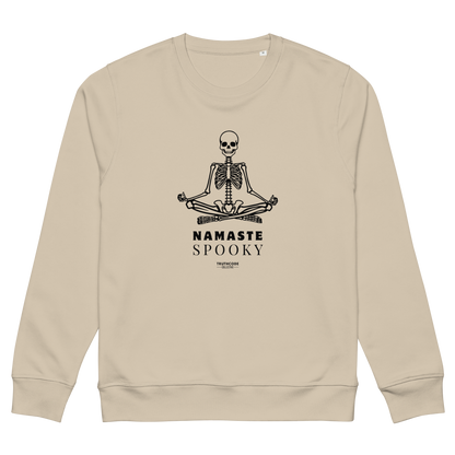 Beige organic sweatshirt with a skeleton design and 'Namaste Spooky' text on a white background