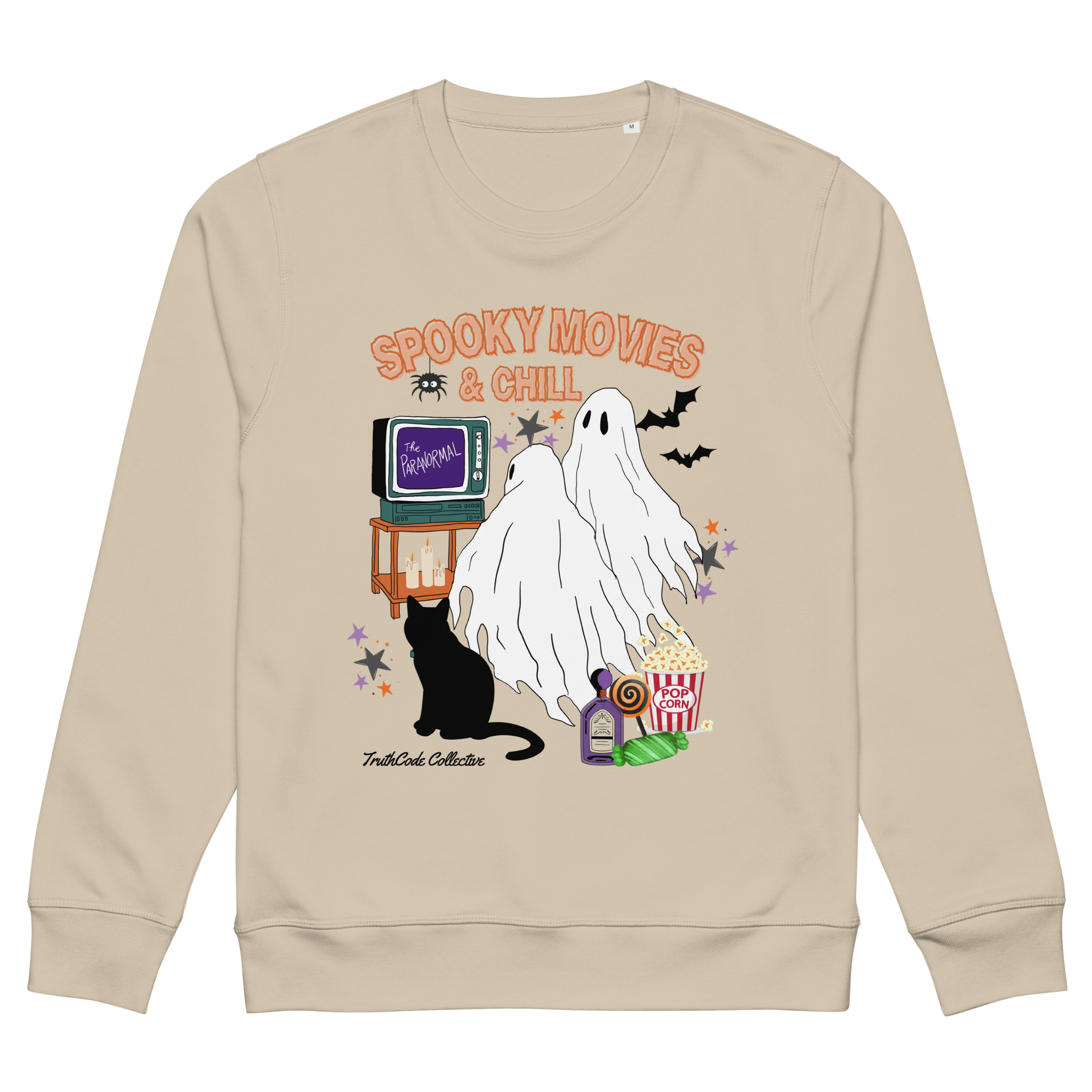 Beige organic sweatshirt with Halloween-themed design featuring a ghost, black cat, TV, and popcorn and text 'Spooky movies and chill' on a white background