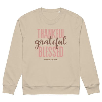 Beige organic sweatshirt with 'Thankful grateful BLESSED' text design on a white background