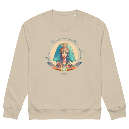 Beige organic sweatshirt with a colorful graphic of an Egyptian woman in a headdress and text 'Magic, Sovereignty, Love' on a white background