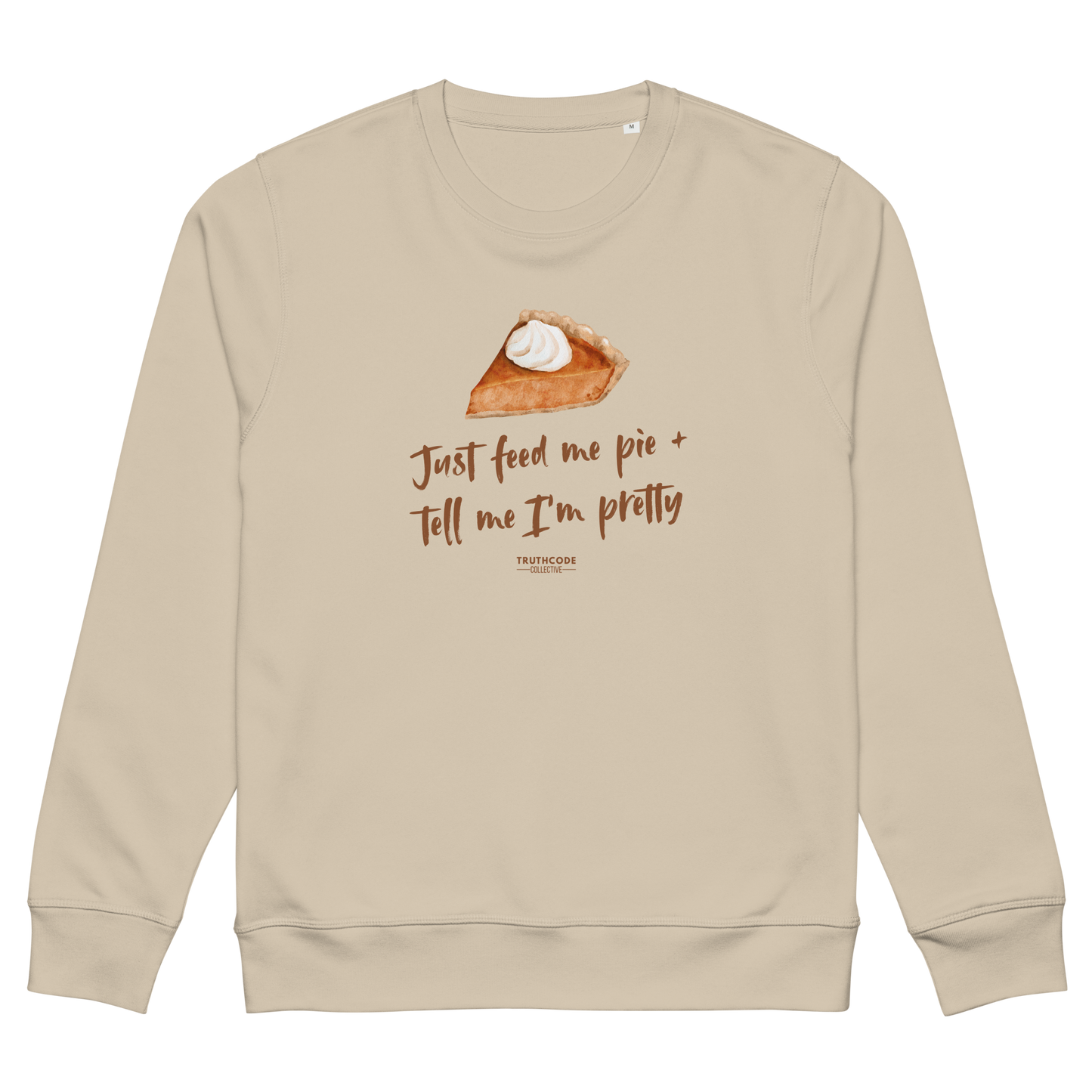 Beige organic sweatshirt with a pie graphic and text 'Just feed me pie and tell me I'm pretty' on a white background