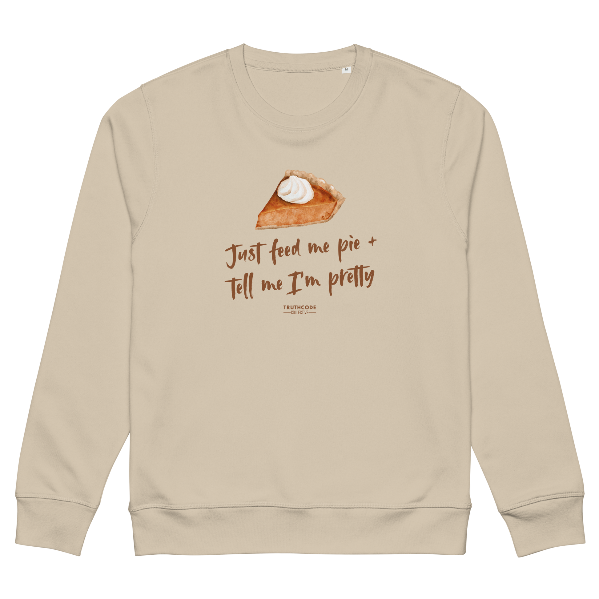 Beige organic sweatshirt with a pie graphic and text 'Just feed me pie and tell me I'm pretty' on a white background