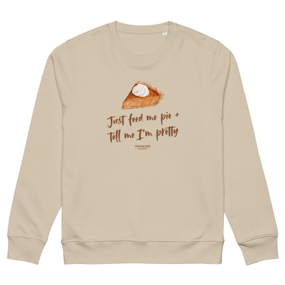 Beige organic sweatshirt with a pie graphic and text 'Just feed me pie and tell me I'm pretty' on a white background