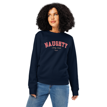 Woman wearing navy blue organic sweatshirt with 'NAUGHTY, sorry Santa' text in red on a white background