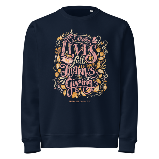 Navy blue organic sweatshirt with colorful text design 'Let our lives be full of both thanks and giving' on a white background