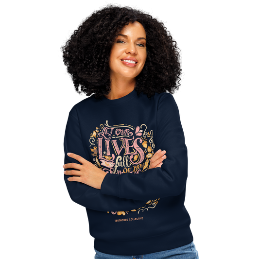 Woman wearing navy blue organic sweatshirt with colorful text design 'Let our lives be full of both thanks and giving' on a white background