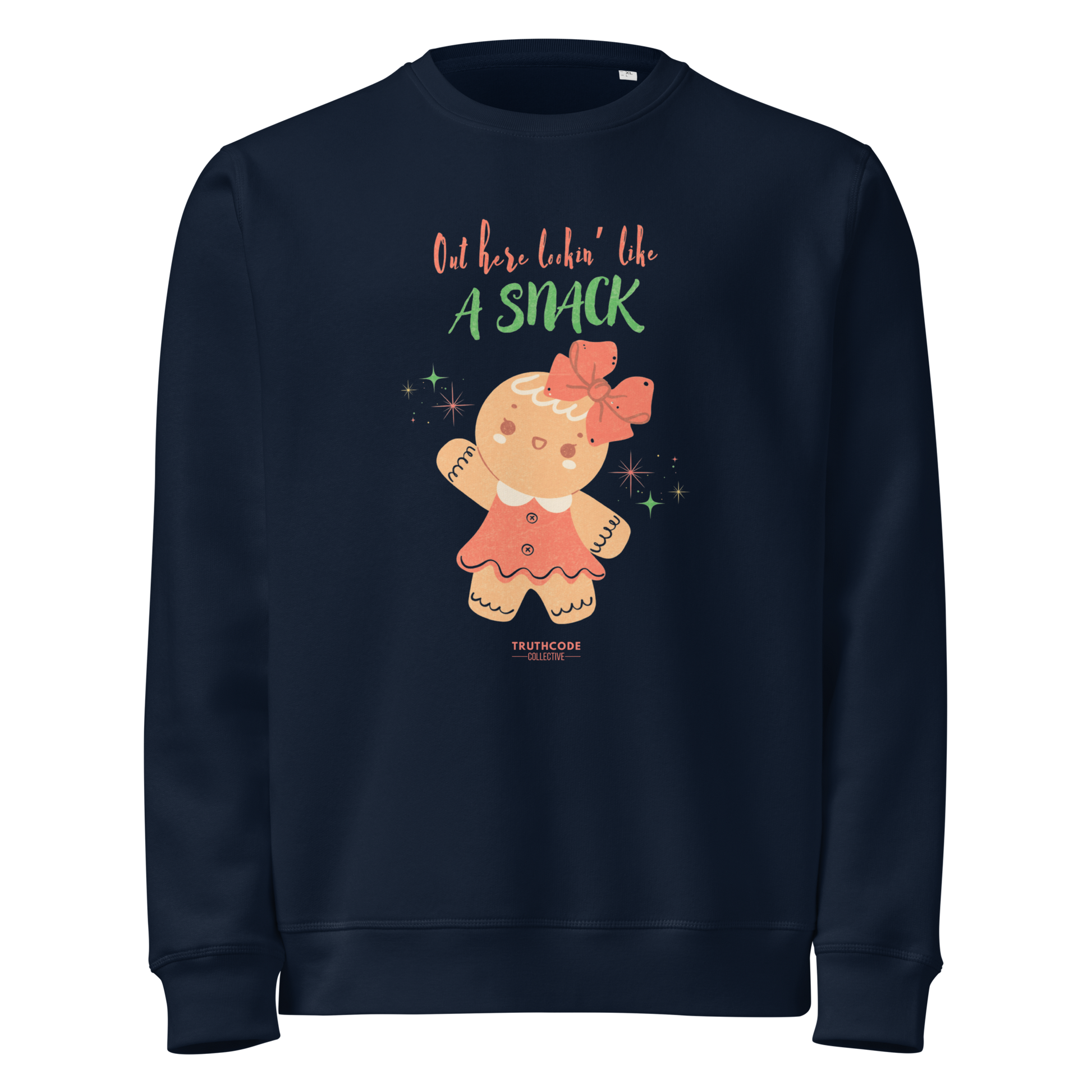 Navy blue organic sweatshirt with a gingerbread girl graphic and text 'Out here lookin' like a snack' on a white background