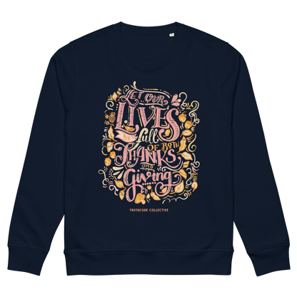 Navy blue organic sweatshirt with colorful text design 'Let our lives be full of both thanks and giving' on a white background
