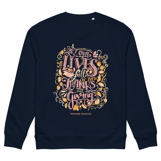 Navy blue organic sweatshirt with colorful text design 'Let our lives be full of both thanks and giving' on a white background