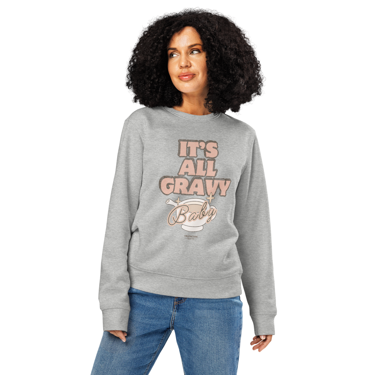 Woman wearing gray organic sweatshirt with 'It's All Gravy Baby' text and graphic design of a gravy boat on a white background