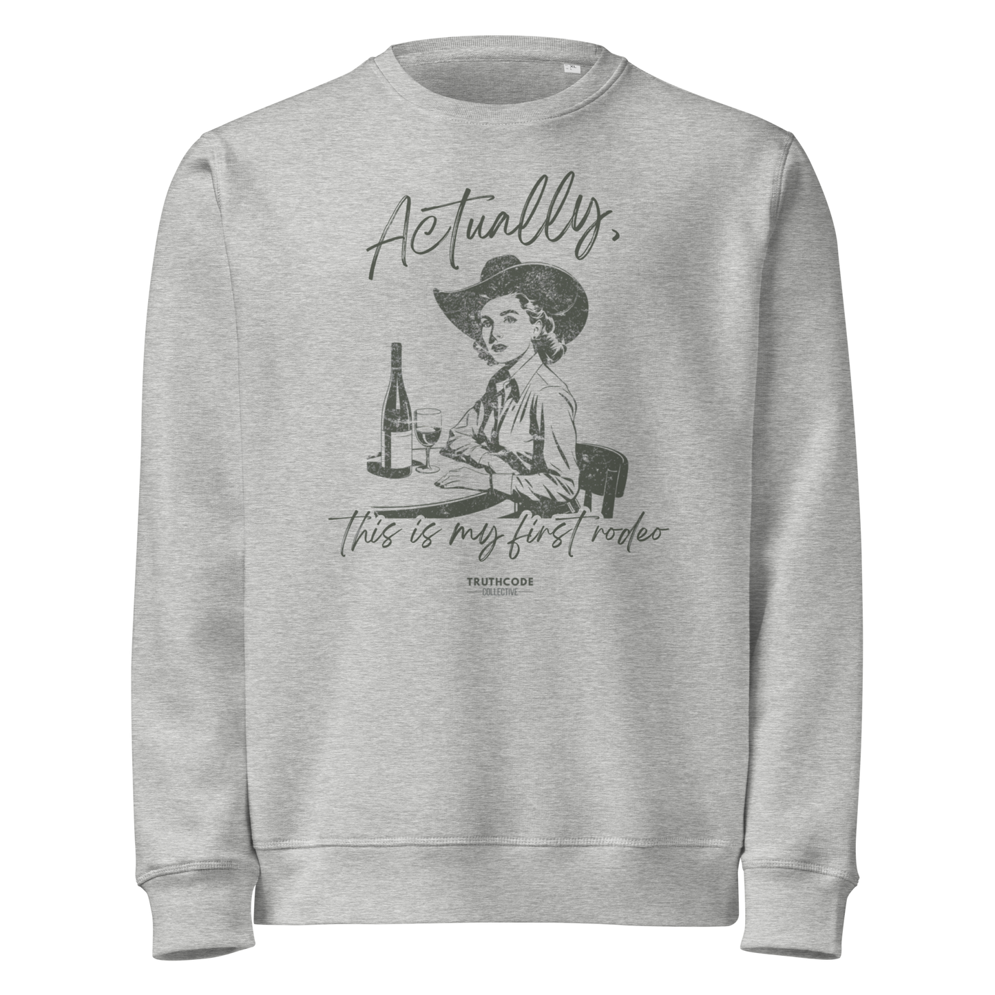 Gray organic sweatshirt with vintage graphic of a woman in a cowboy hat and text 'Actually, this is my first rodeo' on a white background