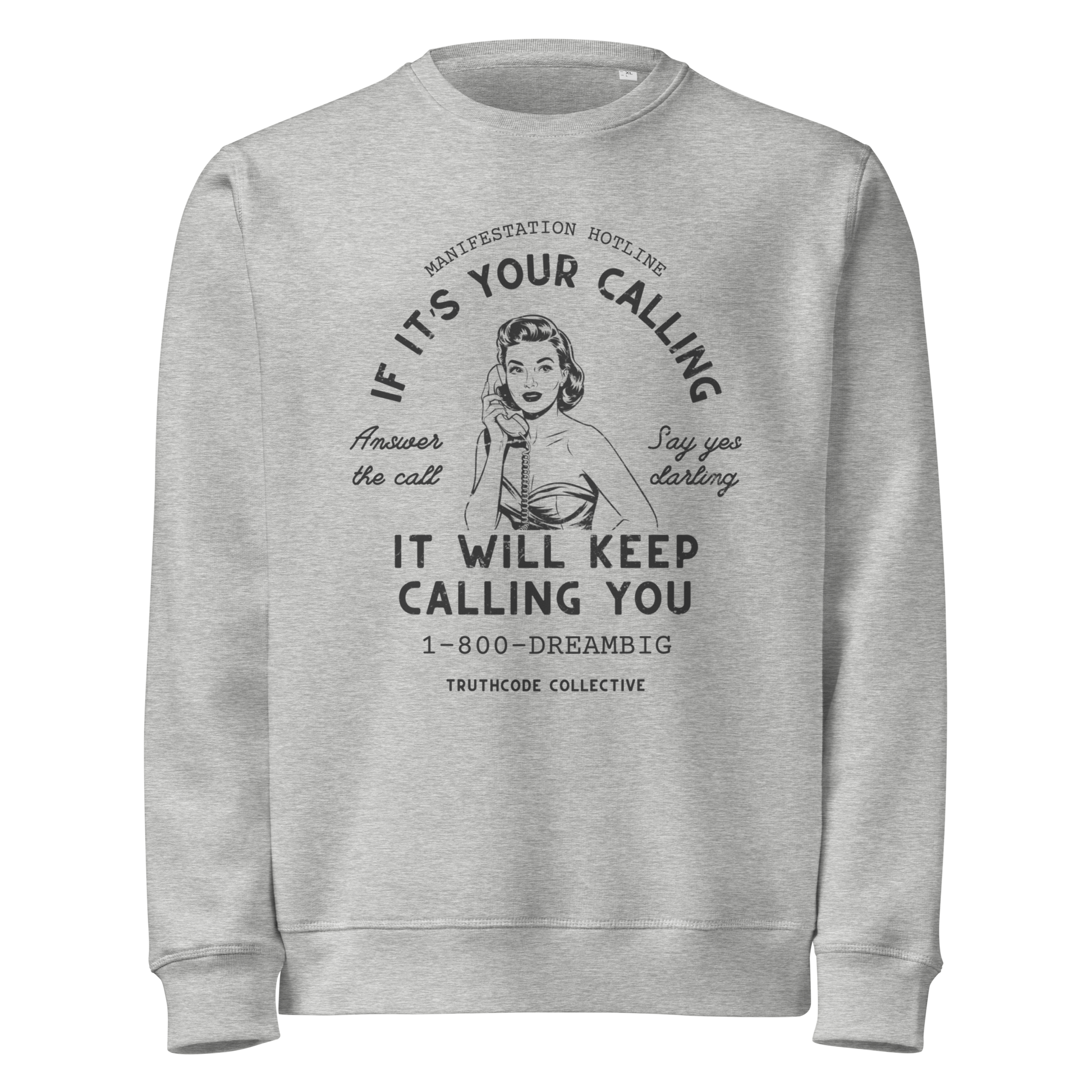 Gray organic sweatshirt with vintage-style graphic of a woman on the phone and text 'If it's your calling, it will keep calling you' and '1-800-DREAMBIG' on a white background