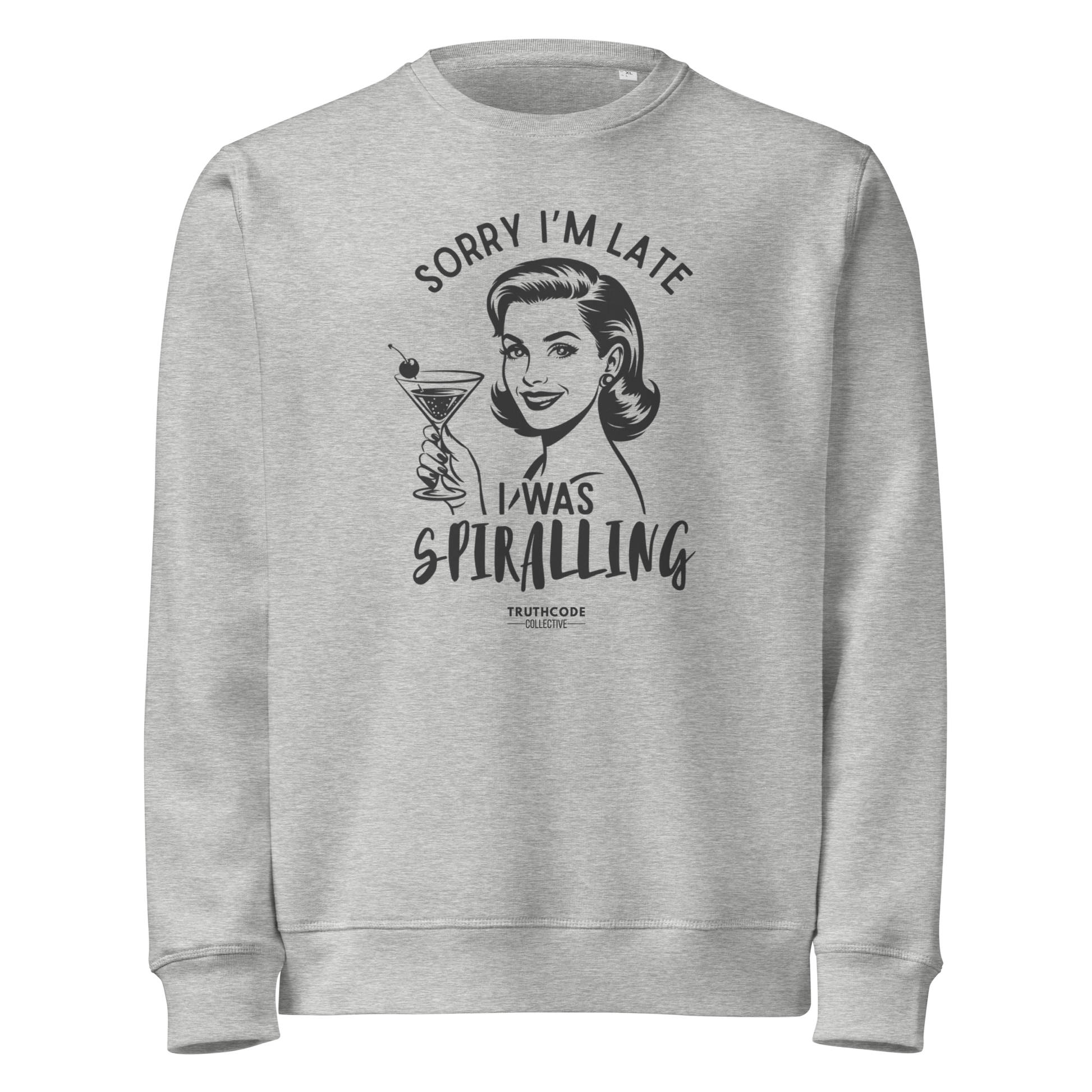Gray organic sweatshirt with vintage graphic design of woman holding a drink and text 'Sorry I'm late I was spiraling' on a white background